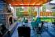 outdoor fireplace slate patio tuscan pergola